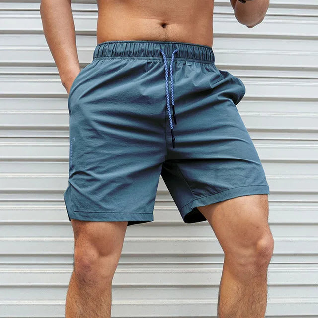 Shorts Uomo da corsa, squat, fitness palestra
