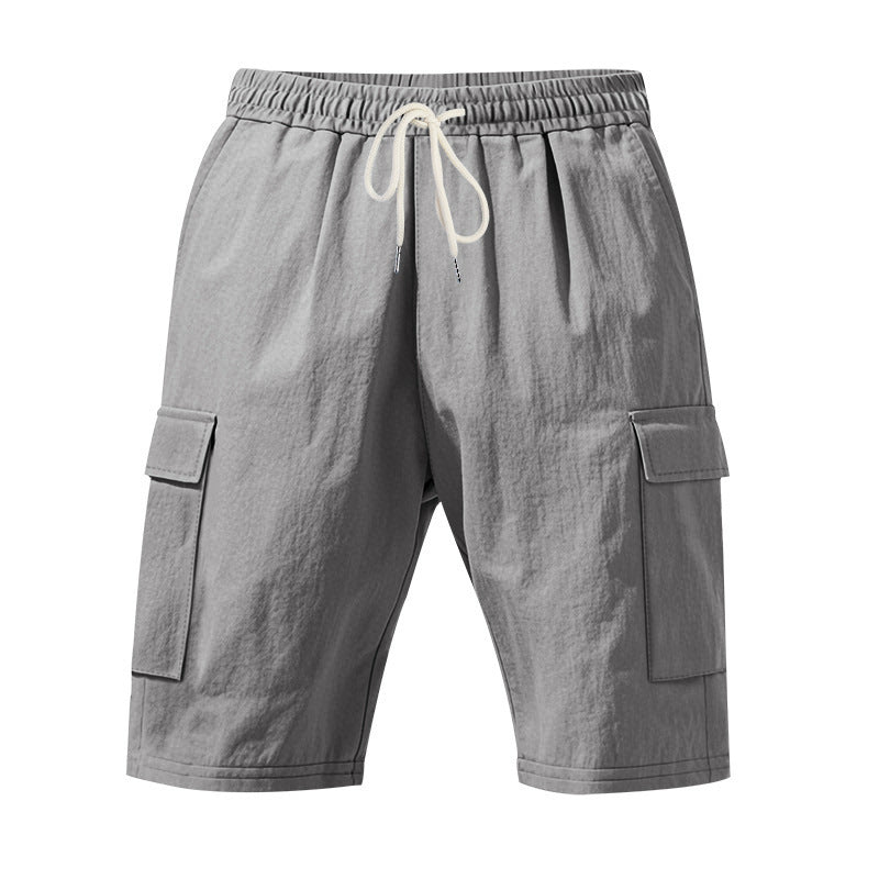 Shorts estivi da uomo in lino, larghi e traspiranti, con più tasche